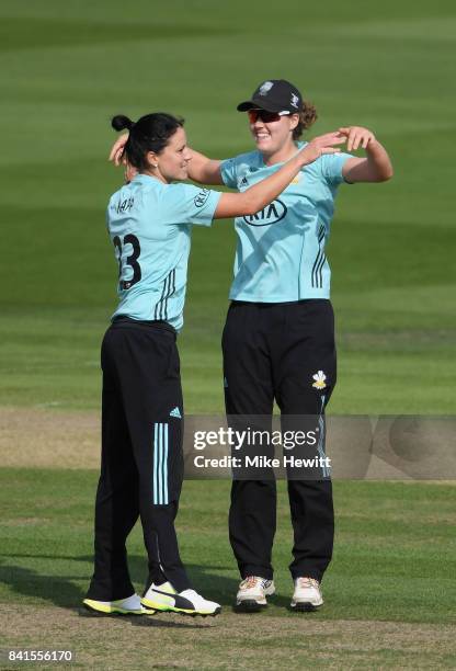 Marizanne Kapp of Surrey Stars celebrates with teammate Grace Gibbs after dismissing Sophie Luff of Western Storm during the Women's Kia Super League...