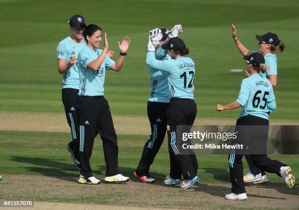 Marizanne Kapp of Surrey Stars celebrates with teammates after dismissing Sophie Luff of Western Storm during the Women's Kia Super League Semi Final...