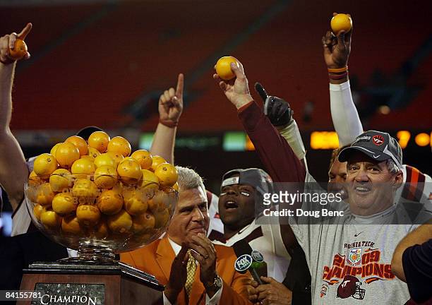 Head coach Frank Beamer of the Virginia Tech Hokies celebrates after defeating the Cincinnati Bearcats to win the FedEx Orange Bowl at Dolphin...