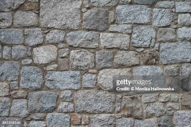 stone wall - stone wall texture stock pictures, royalty-free photos & images