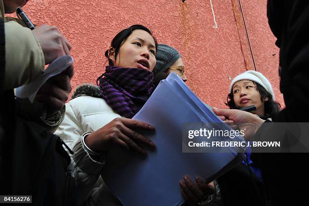 Group of tearful parents whose babies suffered from melamine-tainted milk, including Zhang Li , a 26-year-old mother from China's southeastern...