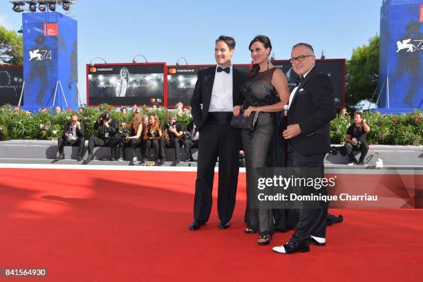 Vittorio Palazzi, Isabelle Adriani and Stefano Blandaleone walk the red carpet ahead of the 'Lean On Pete' screening during the 74th Venice Film...