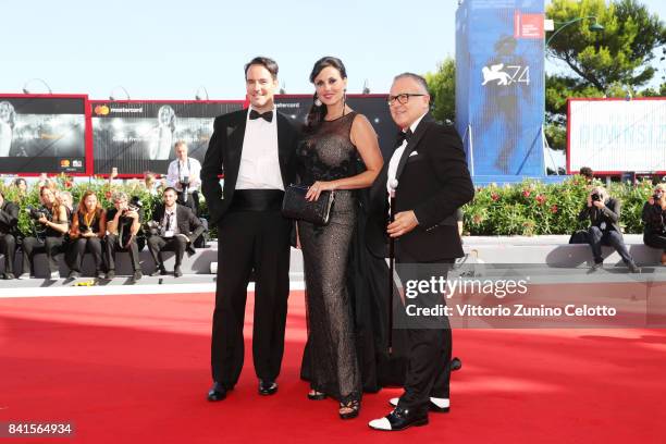 Vittorio Palazzi, Isabelle Adriani and Stefano Blandaleone walk the red carpet ahead of the 'Lean On Pete' screening during the 74th Venice Film...