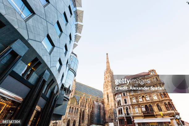 mixture of old and new architecture in vienna, austria - stephansplatz stock pictures, royalty-free photos & images