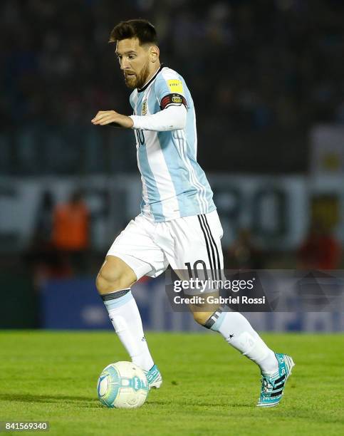 Lionel Messi of Argentina drives the ball during a match between Uruguay and Argentina as part of FIFA 2018 World Cup Qualifiers at Centenario...