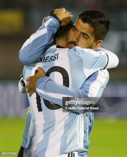 Lionel Messi of Argentina and Luis Suarez of Uruguay hug prior a match between Uruguay and Argentina as part of FIFA 2018 World Cup Qualifiers at...