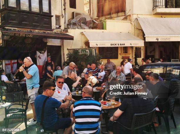Fans enjoy pre-match refreshments prior to the FIFA 2018 World Cup Qualifier between England and Malta on September 1, 2017 in Valletta, Malta.