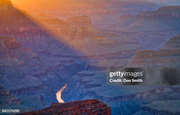 warm ligh shaft and grand canyon - hopi point stock pictures, royalty-free photos & images