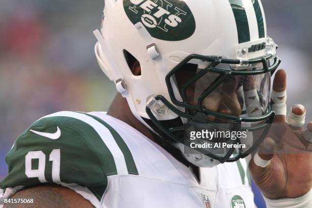 Defensive Lineman Sheldon RIchardson of the New York Jets follows the action against the New York Giants during a preseason game on August 26, 2017...