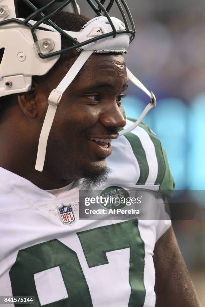 Defensive Lineman Lawrence Thomas of the New York Jets follows the action against the New York Giants during a preseason game on August 26, 2017 at...