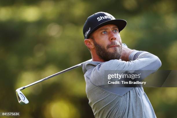 Graham DeLaet of Canada plays his shot from the 11th tee during round one of the Dell Technologies Championship at TPC Boston on September 1, 2017 in...