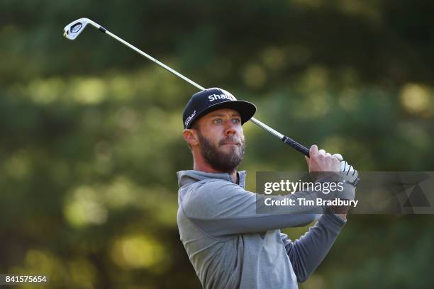 Graham DeLaet of Canada plays his shot from the 11th tee during round one of the Dell Technologies Championship at TPC Boston on September 1, 2017 in...