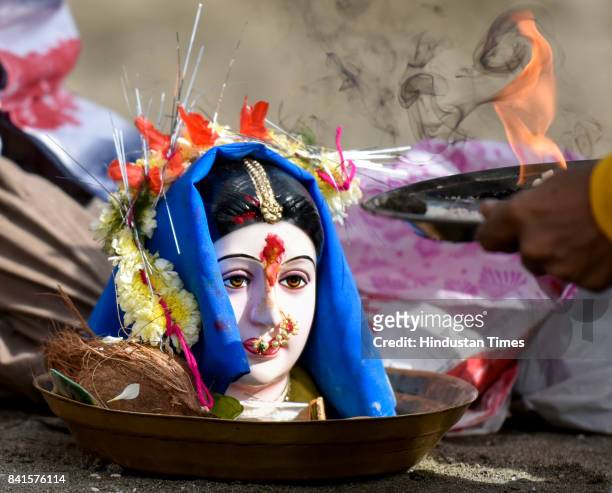 Idols of Goddess Gauri, mother of Lord Ganesha, during Gauri Visarjan at Dadar Beach, on August 31, 2017 in Mumbai, India. Several devotees, who...