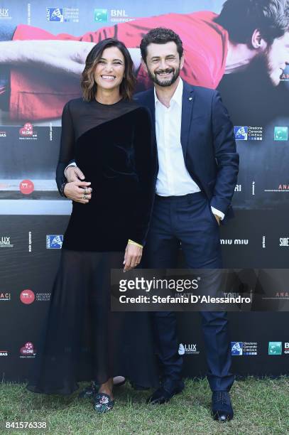 Anna Foglietta and Vinicio Marchioni attend 'Il Contagio' photocall during the 74th Venice Film Festival at Villa degli Autori on September 1, 2017...