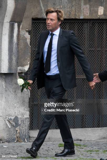 Journalist Laurent Delahousse attends actress Mireille Darc's Funeral at Eglise Saint-Sulpice on September 1, 2017 in Paris, France.