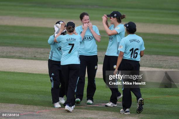 Rene Farrell of Surrey Stars celebrates with teammates after dismissing Lissy Macleod of Western Storm during the Women's Kia Super League Semi Final...