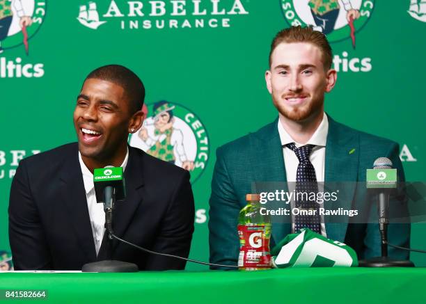 Kyrie Irving and Gordon Hayward of the Boston Celtics laugh during their introduction at TD Garden on September 1, 2017 in Boston, Massachusetts.