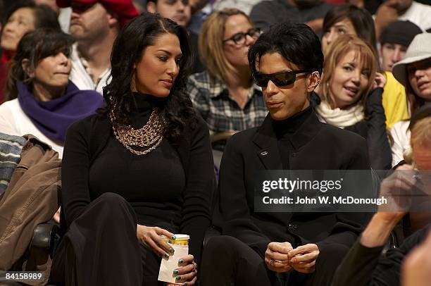 Celebrity musician Prince with Bria Valente, courtside during Boston Celtics vs Los Angeles Lakers game. Los Angeles, CA CREDIT: John W. McDonough