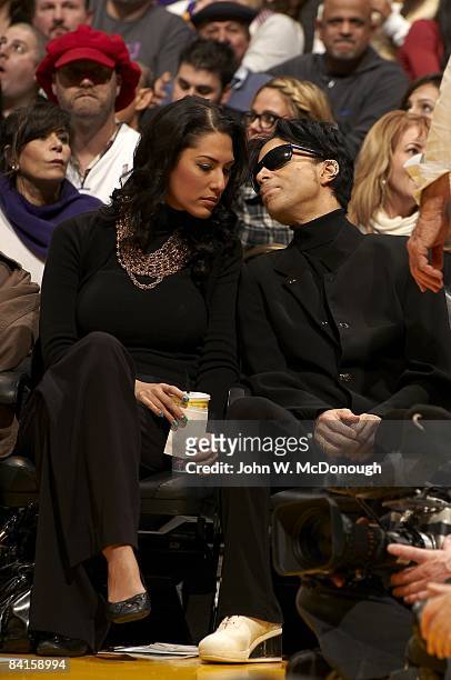 Celebrity musician Prince with Bria Valente, courtside during Boston Celtics vs Los Angeles Lakers game. Los Angeles, CA CREDIT: John W. McDonough