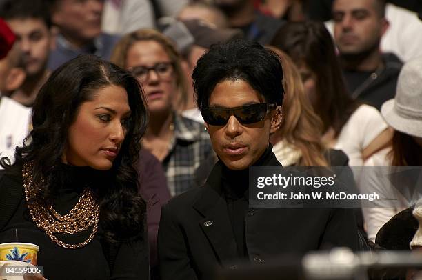 Celebrity musician Prince with Bria Valente, courtside during Boston Celtics vs Los Angeles Lakers game. Los Angeles, CA CREDIT: John W. McDonough