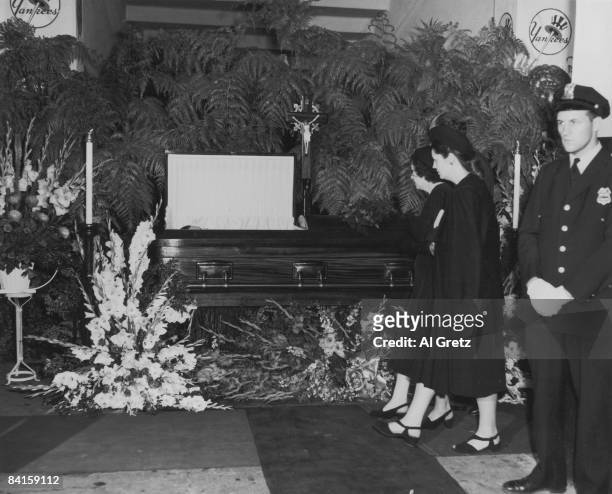 As the body of American baseball player Babe Ruth lies in state in the rotunda of Yankee Stadium, his wife Claire Ruth and daughter Julia Ruth...
