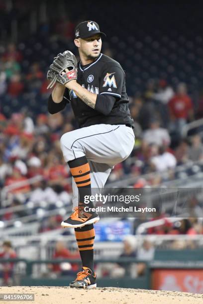 Dustin McGowan of the Miami Marlins pitches during a baseball game against the Washington Nationals at Nationals Park on August 28, 2017 in...