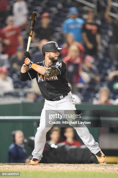 Mike Aviles of the Miami Marlins prepares for a pitch during a baseball game against the Washington Nationals at Nationals Park on August 28, 2017 in...