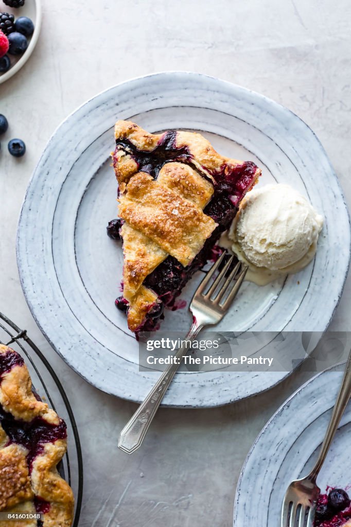 Slice of Berry Pie on a ceramic plate