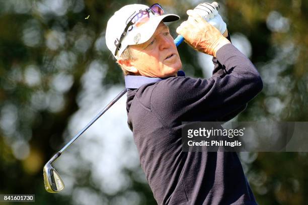 Des Smyth of Ireland in action during the first round of the Travis Perkins Senior Masters played on the Duke's Course at Woburn Golf Club on...