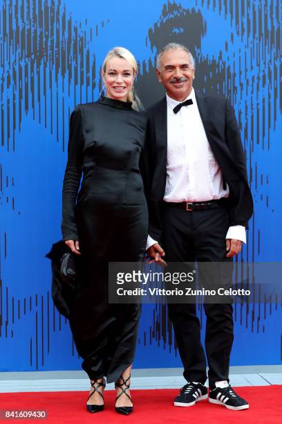 Stefania Rocca and Carlo Capasa attend the The 1st Franca Sozzani Award during the 74th Venice Film Festival at Sala Giardino on September 1, 2017 in...