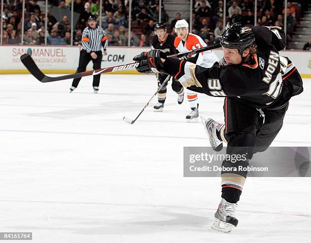 Travis Moen of the Anaheim Ducks shoots the puck against the Philadelphia Flyers during the game on January 2, 2009 at Honda Center in Anaheim,...