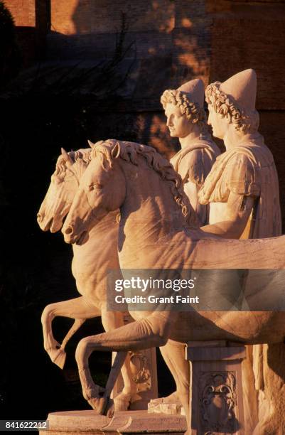 view of ancient horsemen at sunset. - castor and pollux stock pictures, royalty-free photos & images