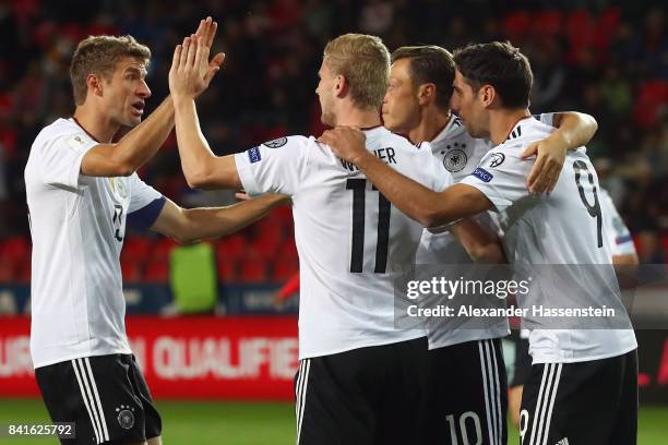 Timo Werner of Germany celebrates his team's first goal with team mates during the FIFA World Cup Russia 2018 Group C Qualifier between Czech...