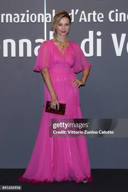 Violante Placido walks the red carpet ahead of the 'Nato A Casal Di Principe' screening during the 74th Venice Film Festival at Sala Giardino on...