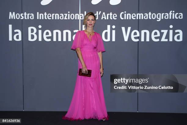 Violante Placido walks the red carpet ahead of the 'Nato A Casal Di Principe' screening during the 74th Venice Film Festival at Sala Giardino on...