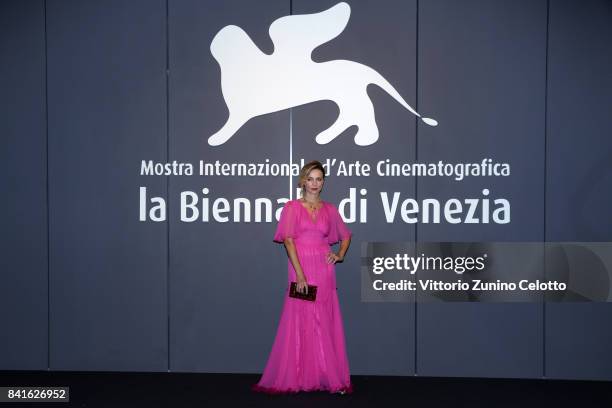 Violante Placido walks the red carpet ahead of the 'Nato A Casal Di Principe' screening during the 74th Venice Film Festival at Sala Giardino on...