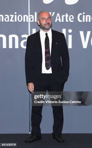 Bruno Oliviero walks the red carpet ahead of the 'Nato A Casal Di Principe' screening during the 74th Venice Film Festival at Sala Giardino on...