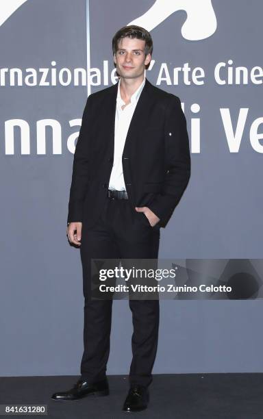 Paolo Marco Caterino walks the red carpet ahead of the 'Nato A Casal Di Principe' screening during the 74th Venice Film Festival at Sala Giardino on...