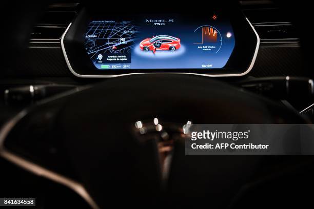 The dashboard of the Tesla Model S car is pictured at the electric carmaker Tesla showroom of El Corte Ingles store in Lisbon, on September 1, 2017....