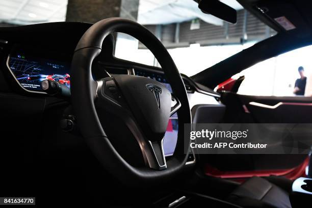 The dashboard of the Tesla Model S car is pictured at the electric carmaker Tesla showroom of El Corte Ingles store in Lisbon, on September 1, 2017....