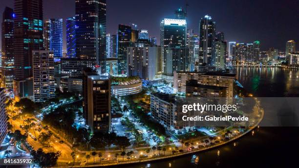 aerial view brickell at night - brickell avenue stock pictures, royalty-free photos & images