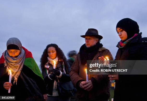 People commemorate victims of Israeli attacks on the Gaza Strip in Amsterdam, on January 3, 2009. Israeli air strikes claimed a Hamas military...