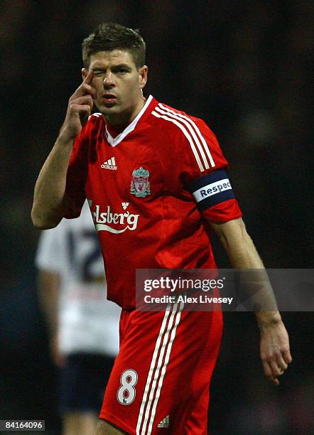 Steven Gerrard of Liverpool gestures to his team mates during the FA Cup sponsored by E.ON Third Round match between Preston North End and Liverpool...