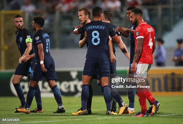 Harry Kane of England celebrates as he scores their first goal with Jake Livermore during the FIFA 2018 World Cup Qualifier between Malta and England...