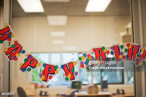 birthday celebration banner at work - birthday office stockfoto's en -beelden