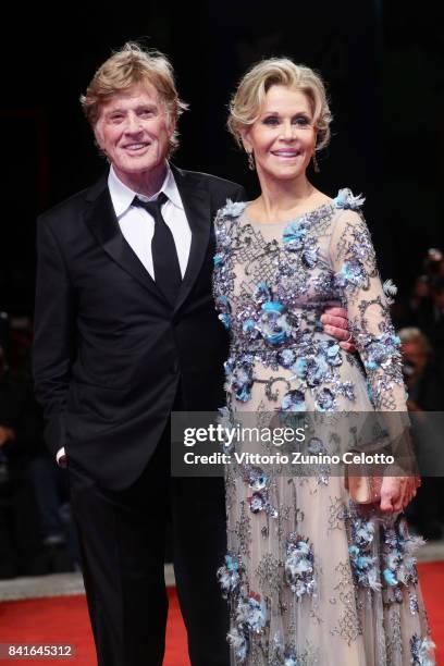 Jane Fonda and Robert Redford walk the red carpet ahead of the 'Our Souls At Night' screening during the 74th Venice Film Festival at Sala Grande on...