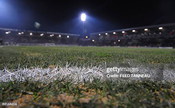 Picture taken on January 3, 2008 shows the frozen field of the Roudourou Stadium, in Guingamp, western France, prior to the cancellation of the...