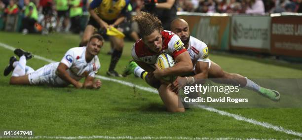 Henry Purdy of Gloucester is tackled by Olly Woodburn during the Aviva Premiership match between Gloucester Rugby and Exeter Chiefs at Kingsholm...