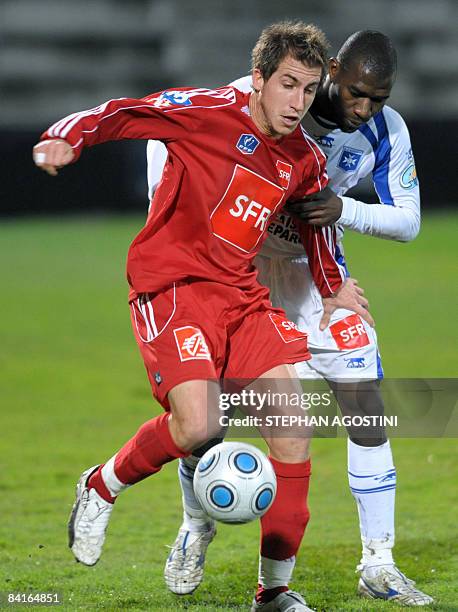 Ajaccio's French forward Julien Viale vies with Auxerre's Malian defender Adama Coulibali during the French cup football match, Ajaccio versus...