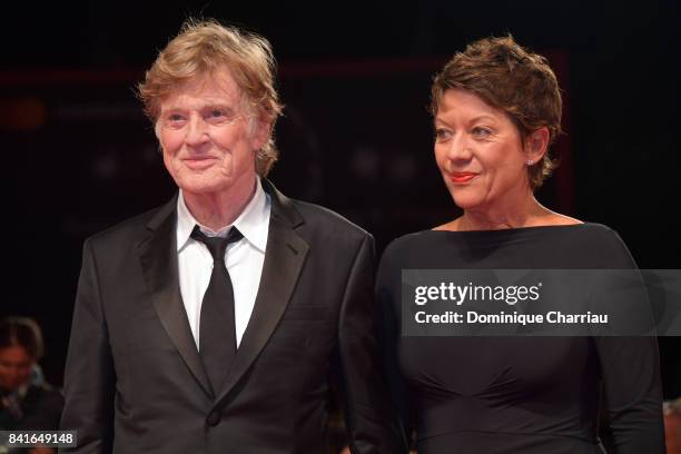 Robert Redford and Sibylle Szaggars walk the red carpet ahead of the 'Our Souls At Night' screening during the 74th Venice Film Festival at Sala...